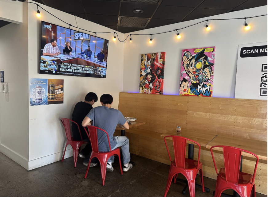 Customers await their order at Korea Town Pizza Company located at 5326 Beach Blvd. in Buena Park on Friday, Oct. 11.